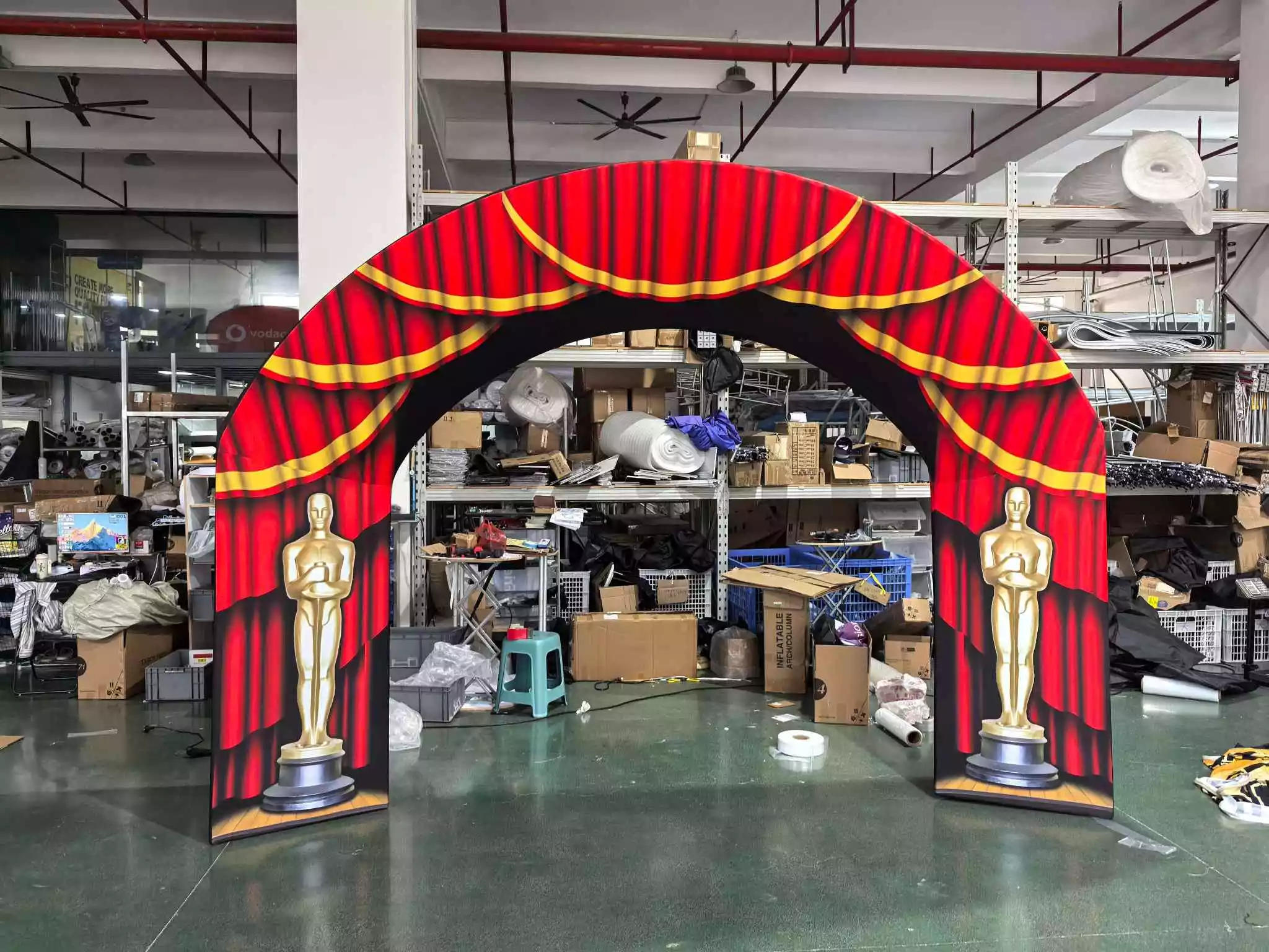 Oscar red curtain themed event arch