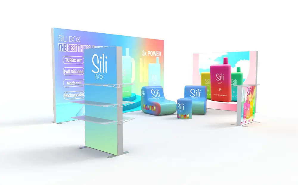 Illuminated product launch display with integrated shelves, freestanding product forms and SEG graphic walls